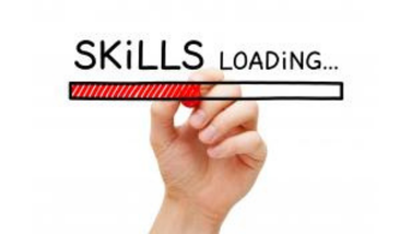 A hand colours in a bar that says "skills loading..."